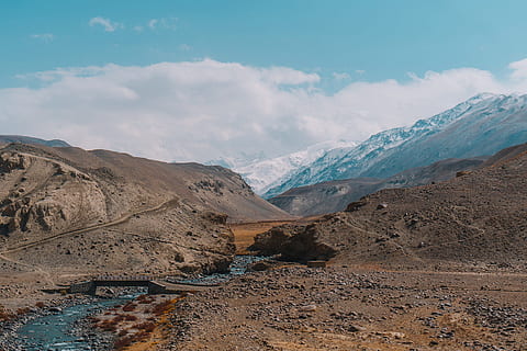 mountain, current, river, water, nature, clouds, environment, scenics - nature, cloud - sky, beauty in nature, sky, landscape, mountain range, non-urban scene, land, tranquil scene, no people, tranquility, extreme terrain, travel, remote, day, climate, arid climate, snowcapped mountain, formation, 1080P, CC0, public domain, royalty free