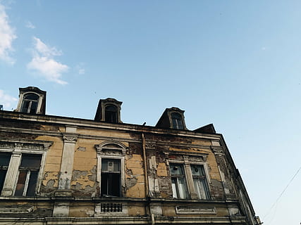 abandoned, architecture, building, low angle shot, perspective, windows, sky, built structure, building exterior, low angle view, nature, no people, day, the past, history, blue, window, outdoors, place of worship, old, religion, sunlight, city, belief, 2K, CC0, public domain, royalty free