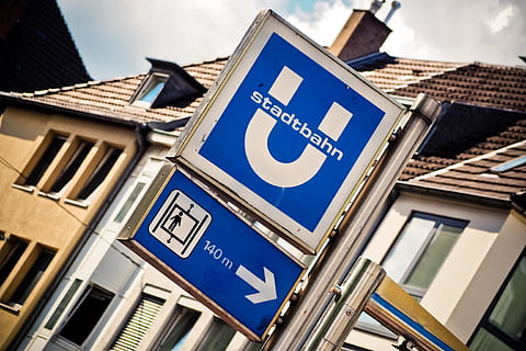 shield, metro, passengers, stop, train, railway station, underground, public means of transport, city, subway, note, logo, passenger transport, billboard, transport, station, düsseldorf, trainstation, urban, metro station, rail traffic, architecture, communication, sign, low angle view, built structure, building exterior, text, no people, blue, building, symbol, sky, outdoors, tilt, window, day, road sign, arrow symbol, letter, 4K, CC0, public domain, royalty free