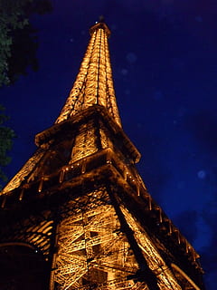 eiffel, tower, eiffel tower, paris, france, architecture, light, night, landmark, low angle view, built structure, sky, building exterior, no people, illuminated, travel destinations, nature, tall - high, history, building, the past, outdoors, architectural feature, travel, dusk, tourism, spire, 2K, CC0, public domain, royalty free