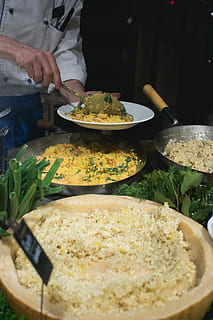 cook scoops risotto, Cook, scoops, risotto, cooking, food, restaurant, meal, vegetable, gourmet, chef, food And Drink, people, human hand, preparation, human body part, one person, freshness, hand, real people, preparing food, indoors, midsection, holding, kitchen utensil, wellbeing, plate, table, ready-to-eat, 5K