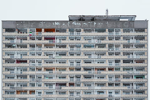 gray, beige, concrete, building, architecture, infrastructure, structure, establishment, apartment, windows, condominium, hotel, residential building, housing development, city, building exterior, development, window, home ownership, balcony, built structure, residential district, day, no people, sky, clear sky, low angle view, nature, outdoors, in a row, full frame, side by side, 4K, CC0, public domain, royalty free