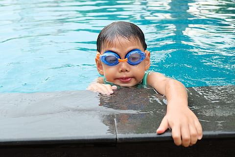 person, hands, water, blue, active, child, face, goggles, h2o, kid, little, outdoors, pool, swim, swimmer, swimming, swimming pool, wet, young, youth, childhood, one person, innocence, portrait, real people, males, front view, lifestyles, day, cute, looking at camera, men, leisure activity, eyewear, 4K, CC0, public domain, royalty free