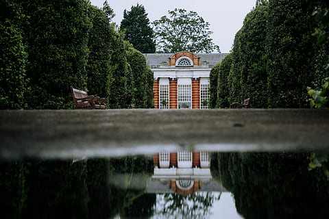 brown, gray, concrete, house, green, trees, reflection, white, painted, wate, tree, water, orangery, bush, bench, chair, exterior, window, architecture, england, united kingdom, puddle, home, built structure, plant, building exterior, nature, no people, building, green color, day, outdoors, focus on background, lake, growth, travel destinations, history, 5K, CC0, public domain, royalty free