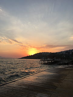 bodrum, posta de sol, cel, aigua, núvol - cel, escenics - natura, color taronja, bellesa a la natura, mar, tranquil·litat, escena tranquil·la, naturalesa, moll, cap gent, a l'aire lliure, arquitectura, llum solar, idíl·lic, terra, estructura construïda, 4K, CC0, domini públic, lliure de regalies
