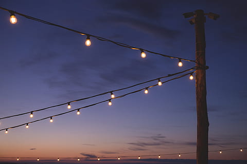 turned, light string lights, still, lights, lanterns, posts, sky, clouds, gradient, pink, purple, long, exposure, bulb, photography, illuminated, dusk, lighting equipment, night, light bulb, nature, electricity, connection, no people, cable, street, street light, low angle view, cloud - sky, outdoors, sunset, light, silhouette, in a row, power supply, 4K, CC0, public domain, royalty free