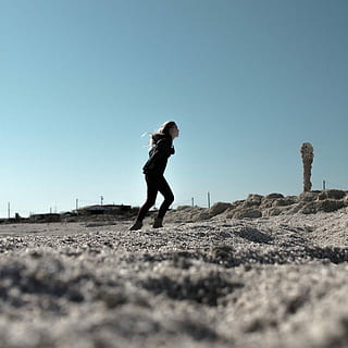 woman, black, jacket, skinny, jeans, walking, uphill, woman in black, skinny jeans, outdoors, one Person, time Of Day, people, adult, copy Space, caucasian Ethnicity, day, image Type, women, sky, image Technique, human Age, full Length, color Image, adults Only, natural Phenomenon, standing, sand, motion, desert, land, real people, clear sky, lifestyles, nature, side view, beach, leisure activity, sunlight, casual clothing, child, 720P, CC0, public domain, royalty free