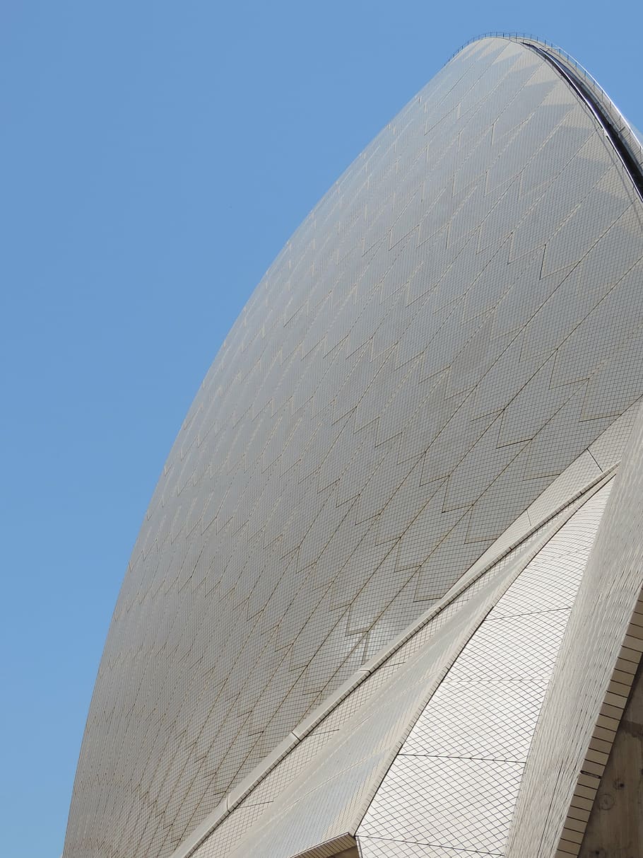 arquitectura, estructura, construcció, edifici, ciutat, arquitectònic, enginyeria, modern, perspectiva, exterior, casa de l'Òpera de Sydney, Austràlia, nous gallois del sud, turisme, icònica, simbòlic, sydney, corba, reialesa, fotografia d'estoc, estructura construïda, cel, vista d’angle baix, dia, exterior de l'edifici, cel clar, cap gent, naturalesa, destinacions de viatge, a l'aire lliure, blau, llum solar, viatjar, Color blanc, primer pla, cultura i entreteniment artístic, angle, 4K