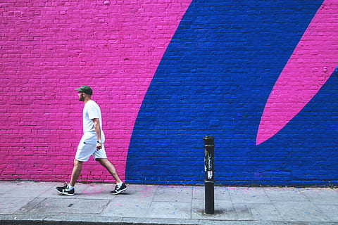 man, walks, past, coloured, brick wall, east, london, East London, people, graffiti, street Art, outdoors, men, one Person, lifestyles, urban Scene, adult, young Adult, caucasian Ethnicity, full length, adults only, one man only, wall - building feature, casual clothing, real people, standing, day, leisure activity, architecture, pink color, built structure, footpath, sport, city, building exterior, young men, 4K