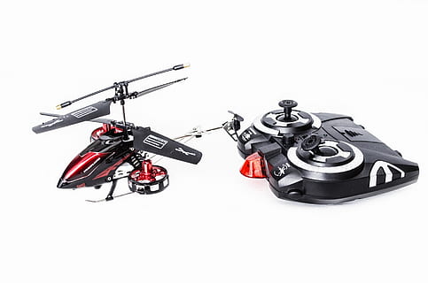 toy, controlled, electric, model, fly, fun, remote, playing, rotor, engine, helicopter, object, electrical, motor, pleasure, hobby, aircraft, working, wire, radio, flight, piloting, handset, studio shot, white background, cut out, equipment, technology, black color, indoors, copy space, no people, sport, still life, machinery, communication, red, preparation, high angle view, connection, single object, group of objects, 1080P, CC0, public domain, royalty free