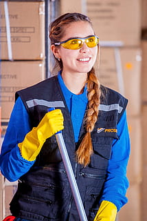 smiling, woman, holding, gray, metal rod, standing, beside, stacked, cardboard boxes, Industrial, Security, Logistic, work clothes, industrial safety, protective goggles, vest, worker, mandatory, manufactures, personal protection, supervisor, cellular, women, face, bella, mobile, communication, model, mask, respirator, gloves, mop, cleaning, clean, toilet, protective glove, manual worker, one person, one woman only, only women, washing up glove, front view, indoors, protection, occupation, protective workwear, real people, happiness, safety, adult, waist up, emotion, glasses, young adult, hairstyle, 4K, CC0, public domain, royalty free