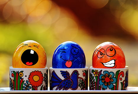 three, assorted-color egg decors, cup, selective, focus photography, easter, easter eggs, funny, face, fun, colorful, happy easter, egg, colored, color, decoration, creativity, art and craft, multi colored, human representation, close-up, representation, no people, focus on foreground, indoors, still life, group of objects, male likeness, craft, female likeness, choice, toy, celebration, selective focus, table, pattern, ornate, 2K, CC0, public domain, royalty free