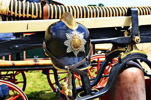 fireman, fire, helm, historically, transportation, mode of transportation, day, land vehicle, metal, close-up, focus on foreground, nature, outdoors, wood - material, no people, cart, bicycle, stationary, wheel, pattern, seat, bench, sunlight, 4K, CC0, public domain, royalty free