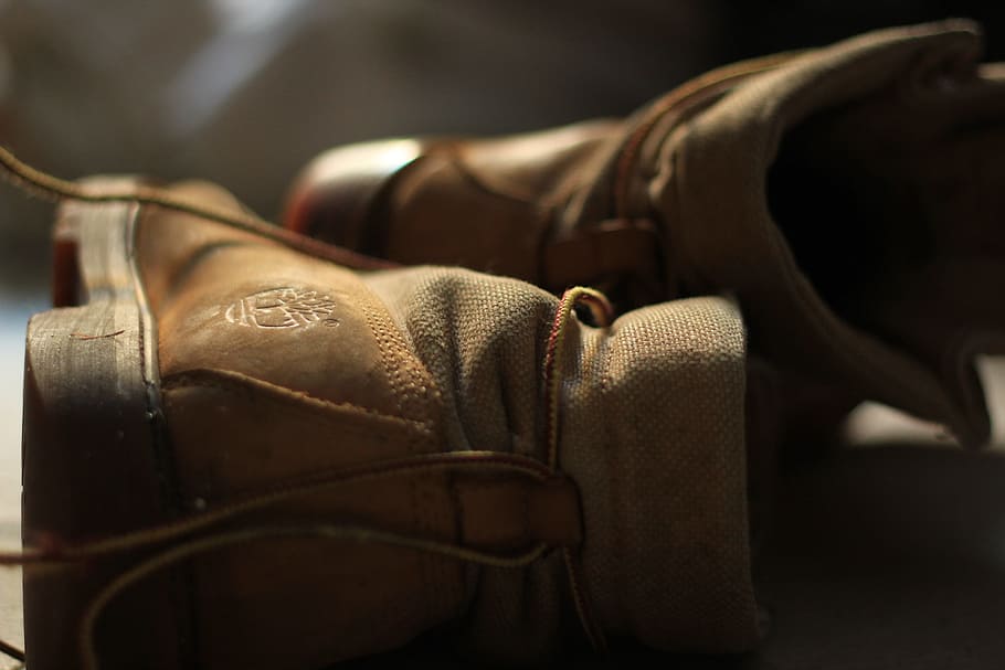 brown boots, boots, close-up, footwear, indoors, no people, clothing, leather, brown, wealth, luxury, shoe, selective focus, elegance, seat, furniture, business, fashion, bag, focus on foreground, travel, chair, high society, 5K