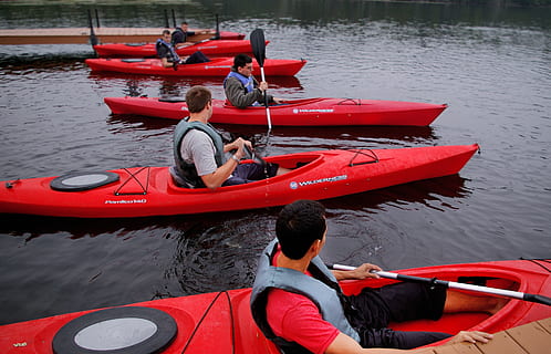 people riding kayaks, boats, canoe, group, kayak, lake, leisure, men, oar, outdoors, paddle, people, recreation, river, water, water sports, watercraft, nautical vessel, transportation, mode of transportation, real people, life jacket, day, nature, group of people, red, leisure activity, safety, sitting, 2K, CC0, public domain, royalty free