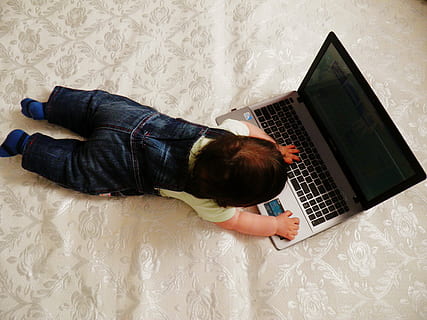 high-angle photography, baby, playing, laptop, kid, technique, notebook, development, kids, game, learn, boy, childhood, small child, toys, computer, technology, one person, directly above, wireless technology, communication, indoors, high angle view, connection, lying down, computer equipment, casual clothing, using laptop, men, keyboard, computer keyboard, adult, furniture, typing, jeans, 4K, CC0, public domain, royalty free