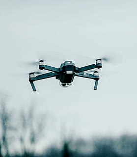 black, drone, flying, air, camera, clouds, sky, video, record, no people, day, airplane, outdoors, futuristic, close-up, transportation, mode of transportation, low angle view, air vehicle, mid-air, motion, nature, travel, on the move, journey, blurred motion, tree, aerospace industry, 4K, CC0, public domain, royalty free