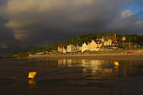 beach, sunset, reflections, sun, sea, sky, sand, lying, light, twilight, evening, landscape, nature, contrast, colors, water, side, bright colors, calm, clouds, normandy, houlgate, reflection, cloud - sky, architecture, built structure, building exterior, building, city, waterfront, no people, night, overcast, illuminated, land, outdoors, 1080P, CC0, public domain, royalty free
