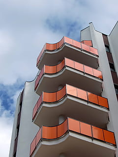 architecture, balconies, skyscraper, facade, building, home, modern, residence, skyscrapers, orange, built structure, building exterior, sky, low angle view, cloud - sky, no people, day, nature, window, city, outdoors, office, pattern, office building exterior, in a row, residential district, glass - material, apartment, 2K, CC0, public domain, royalty free