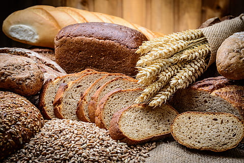 sourdough, wheat photo, bread, candy, pies, food and drink, food, freshness, healthy eating, loaf of bread, store, wellbeing, cereal plant, bakery, no people, wheat, variation, still life, crop, baked, whole wheat, agriculture, close-up, indoors, rye - grain, bun, brown bread, 5K, CC0, public domain, royalty free