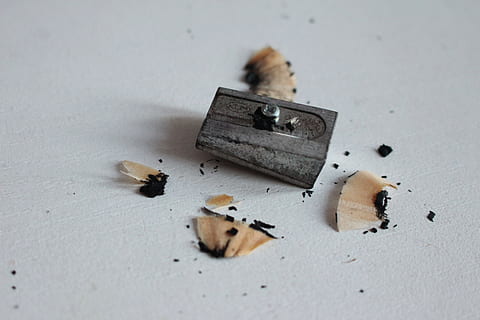 gray, sharpener, pencil sharpener, pencil, indoors, pencil shavings, still life, no people, wood - material, shavings, selective focus, high angle view, art and craft, close-up, studio shot, table, creativity, white background, eraser, focus on foreground, writing instrument, group of objects, 5K, CC0, public domain, royalty free
