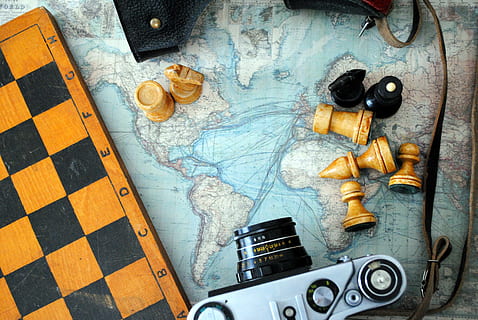 slr camera, chess board, chess, camera, world map, indoors, no people, close-up, day, high angle view, map, work tool, still life, directly above, wood - material, table, creativity, old, art and craft, preparation, security, group of objects, travel, protection, hand saw, 4K, CC0, public domain, royalty free