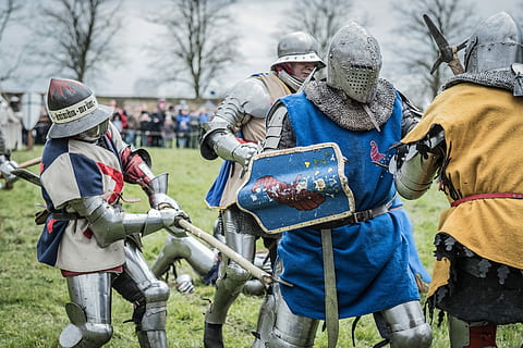 soldiers figurines, helm, armor, fight, war, knight, sword, battle, clothing, group of people, day, real people, nature, hat, plant, men, headwear, standing, field, people, winter, tree, protection, focus on foreground, holding, outdoors, adult, helmet, warm clothing, 5K, CC0, public domain, royalty free