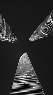 building, bw, architecture, built structure, building exterior, no people, low angle view, illuminated, night, pattern, tall - high, tower, city, lighting equipment, shape, metal, diminishing perspective, travel destinations, travel, sky, directly below, skyscraper, office building exterior, 5K, CC0, public domain, royalty free