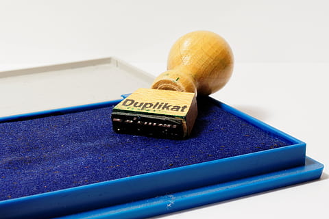 stamp, duplicate, office, paper, stamp pads, indoors, blue, close-up, still life, no people, communication, single object, focus on foreground, technology, table, text, wireless technology, equipment, studio shot, arts culture and entertainment, two objects, white background, personal accessory, message, 2K, CC0, public domain, royalty free