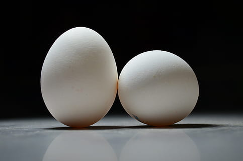 two poultry eggs, eggs, egg, easter, white, of chickens, focus, bw, macro, studio shot, black background, food, two objects, indoors, food and drink, close-up, reflection, animal egg, vulnerability, wellbeing, no people, white color, healthy eating, fragility, raw food, freshness, still life, nature, 2K, CC0, public domain, royalty free