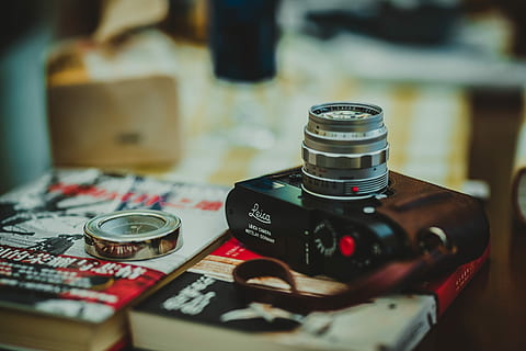 black, digital, camera, red, book, selective, photography, compact, silver-colored ring, books, compass, tech, technology, indoors, selective focus, table, no people, camera - photographic equipment, still life, close-up, photography themes, focus on foreground, high angle view, arts culture and entertainment, equipment, bottle, communication, container, lens - optical instrument, group of objects, work tool, text, digital camera, 8K, CC0, public domain, royalty free
