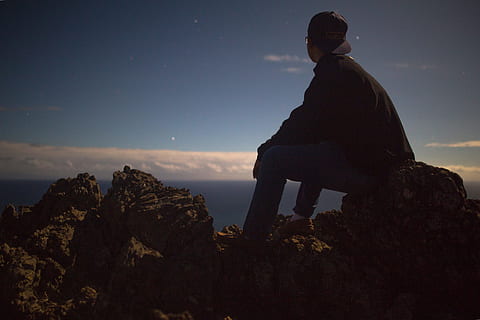 person, sitting, rock, looking, sky, big, silhouette, photo, boy, ocean, thinking, horizon, men, nature, mountain, hiking, outdoors, sunset, rock - Object, people, scenics, landscape, one Person, one man only, adults only, solid, leisure activity, real people, lifestyles, scenics - nature, tranquil scene, tranquility, beauty in nature, night, rock formation, looking at view, 5K, CC0, public domain, royalty free