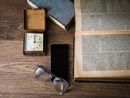 black, framed, eyeglasses, android smartphone, book page, phone, screen, technology, mobile, internet, telephone, smartphone, blank, device, display, digital, smart, iphone, media, ios, glasses, stack, paper, knowledge, library, old, literature, book, open, information, school, study, education, wisdom, textbook, bookshelf, read, vintage, cover, text, writing, page, print, bookcase, studying, wood, reading, retro, wooden, brown, desk, dark, closeup, wall, clock, time, alarm, watch, table, wood - material, indoors, portable information device, directly above, communication, smart phone, still life, connection, wireless technology, no people, sunglasses, personal accessory, mobile phone, leather, eyewear, 4K, CC0, public domain, royalty free