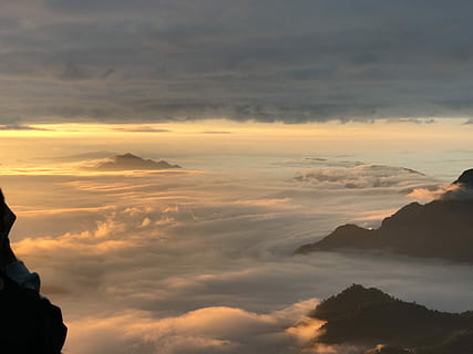 cloud-covered mountaintops, sunset, cloud, sunrise, mountain, landscape, cloud - sky, sky, scenics - nature, beauty in nature, tranquil scene, tranquility, nature, idyllic, silhouette, one person, orange color, real people, outdoors, non-urban scene, cloudscape, mountain range, mountain peak, 4K, CC0, public domain, royalty free