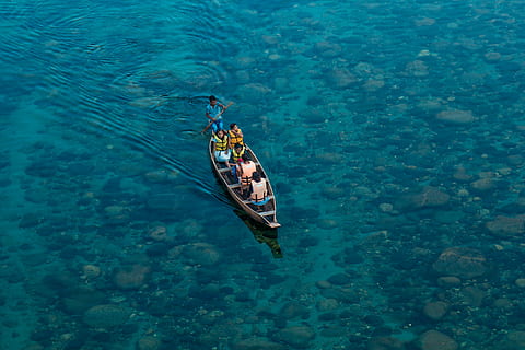 photo, boat, body, water, five, people, canoe, life, vest, sea, ocean, blue, nature, men, women, sailing, transportation, adventure, travel, rocks, outdoor, high angle view, day, outdoors, no people, nautical vessel, animal themes, waterfront, real people, mode of transportation, lifestyles, beauty in nature, leisure activity, turquoise colored, adult, 5K
