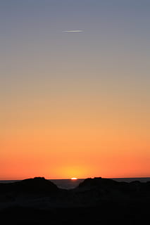 denmark, spring, sunset, sky, red, blue, the sea, nice, yellow, background, beach, orange color, silhouette, scenics - nature, beauty in nature, tranquility, no people, nature, tranquil scene, environment, landscape, copy space, horizon, cloud - sky, non-urban scene, dusk, outdoors, horizon over land, land, vapor trail, 4K, CC0, public domain, royalty free