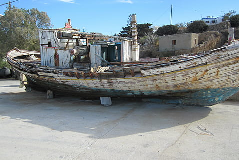 abandoned, boat, city, decay, fishing boat, old, outdoors, river, sailboat, shadow, ship, shipwreck, sky, transportation system, travel, trees, watercraft, wreck, nautical Vessel, sea, ruined, broken, transportation, architecture, built structure, day, mode of transportation, water, nature, building exterior, no people, sunlight, moored, run-down, beach, obsolete, damaged, deterioration, 2K, CC0, public domain, royalty free