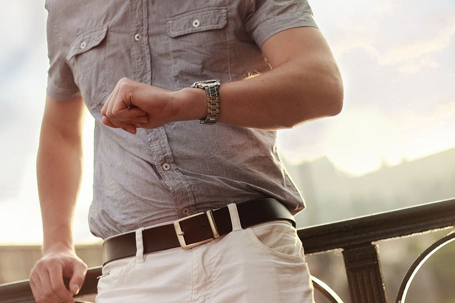 man, wearing, gray, button-up shirt, waiting, appointment, schedule, time, hurry, urgent, timetable, watch, clock, deadline, businessman, business, casual, fashion, belt, pants, shirt, guy, short sleeves, one person, midsection, adult, casual clothing, focus on foreground, holding, day, front view, leisure activity, music, standing, human body part, men, outdoors, nature, lifestyles, musical instrument, hand, 5K
