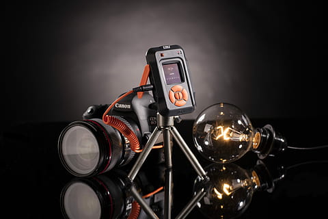 black, canon dslr camera, bulb, beside, light bulb, camera trigger, glass, camera device, camera, canon, camera gear, camera equipment, photographer kit, photographer gear, tripod, filament, dark, orange cable, lens, refleciton, studio shot, technology, black background, indoors, lighting equipment, illuminated, close-up, light, no people, retro styled, communication, single object, photography themes, old, black color, transportation, still life, red, electric lamp, 4K, CC0, public domain, royalty free