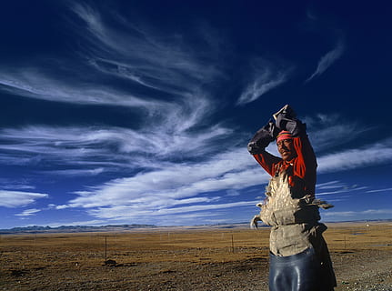 man, standing, gray, steel fence, white, clouds, daytime, wearing, red, suit, outside, blue, sky, In the air, cloud, field, outdoors, nature, cloud - Sky, people, landscape, one man only, adults only, adult, adventure, environment, land, scenics - nature, beauty in nature, day, no people, non-urban scene, tranquil scene, tranquility, horizon over land, horizon, protection, 4K, CC0, public domain, royalty free