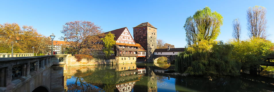 panoramic, photography, lake, trees, house, architecture, tower, bridge, web, autumn, historically, building, old town, medieval, nuremberg, panorama, flyers, hangman's bridge, river, mirroring, water, built structure, building exterior, bridge - man made structure, reflection, tree, nature, connection, plant, sky, no people, blue, city, clear sky, outdoors, arch bridge, 8K, CC0, public domain, royalty free