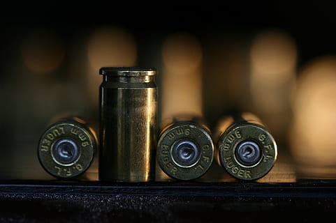 brass-colored bullet, bullets, bullet, shell, weapon, shot, ammunition, cartridge, lead, caliber, firearm, ammo, metal, danger, fire, no people, close-up, focus on foreground, indoors, group of objects, table, selective focus, number, medium group of objects, antique, business, still life, old, arrangement, communication, finance, wood - material, day, text, economy, 1080P, CC0, public domain, royalty free