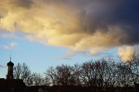Sky, Clouds, Steeple, cloudiness, city view, trees, yellow, blue, bright, cloud - sky, sunset, bare tree, nature, outdoors, tree, architecture, built structure, building exterior, silhouette, no people, plant, scenics - nature, building, tranquility, beauty in nature, tranquil scene, tower, 5K, CC0, public domain, royalty free