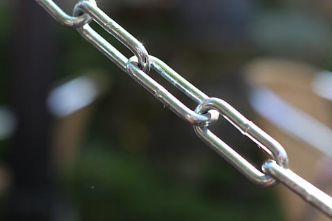 chain, macro, close, mirroring, matt, sun, metal, silver, close-up, focus on foreground, no people, day, outdoors, bicycle, selective focus, mode of transportation, nature, silver colored, transportation, strength, grass, shiny, land vehicle, social issues, steel, safety, travel, alloy, 5K, CC0, public domain, royalty free