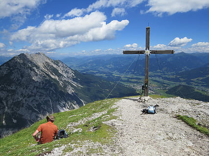 stoderzinken, cross, mountains, view, blue sky, summer, body kits, clouds, mountaineering, austria, climbing, edelweiss, mountain top, walker, gröbming, styria, mountain, scenics - nature, beauty in nature, cloud - sky, mountain range, sky, nature, tranquil scene, non-urban scene, day, rock, idyllic, real people, tranquility, leisure activity, rear view, environment, rock - object, men, solid, outdoors, mountain peak, 4K, CC0, public domain, royalty free
