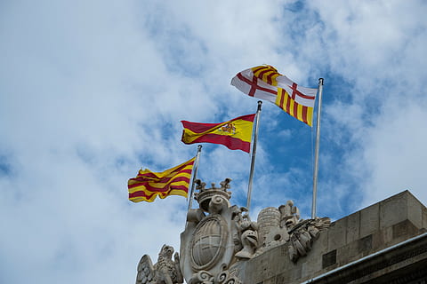 flags, spain, flag, wind, historically, flutter, barcelona, catalonia, sky, cloud - sky, low angle view, patriotism, nature, environment, no people, day, waving, outdoors, representation, architecture, multi colored, building exterior, built structure, pride, shape, 4K, CC0, public domain, royalty free