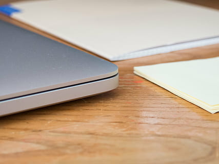 white, printer paper, brown, wooden, surface, silver, device, near, printer, paper, laptop, notebook, notepad, sticky notes, office, desk, business, work, indoors, table, wood - material, close-up, no people, technology, day, wireless technology, selective focus, communication, connection, still life, copy space, note pad, computer, high angle view, furniture, portability, wood grain, blank, 2K, CC0, public domain, royalty free