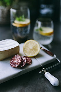 preparing, appetizer food, kitchen, appetizer, food, cheese, sausage, fruits, hands, lemon, vegetables, slice, table, gourmet, freshness, close-up, no People, wood - Material, meat, food and drink, preparation, cross section, citrus fruit, fruit, still life, healthy eating, kitchen knife, indoors, wellbeing, household equipment, drink, knife, refreshment, focus on foreground, glass, temptation, orange, 5K