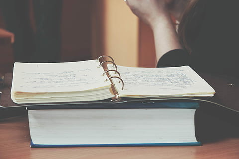 note, open, notepad, top, book, notebook, notes, bible, publication, indoors, human hand, table, real people, paper, one person, education, human body part, communication, holding, close-up, hand, focus on foreground, women, pen, lifestyles, home interior, finger, 5K, CC0, public domain, royalty free
