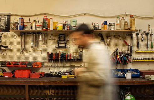person, wearing, gray, long-sleeved, top, beside, workbench, workshop, tool, drill, screwdriver, beige, tools, hammer, hardware, work, motion, blurred motion, occupation, working, men, business, people, on the move, food and drink, indoors, commercial kitchen, real people, adult, architecture, industry, kitchen, food and drink industry, restaurant, walking, chef, 2K, CC0, public domain, royalty free